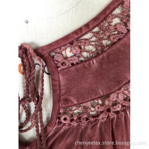 A short-sleeved blouse with tassel cut out